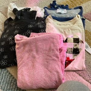 Lot of girls size 7-8; 10-12 long sleeved tees. Various brands.